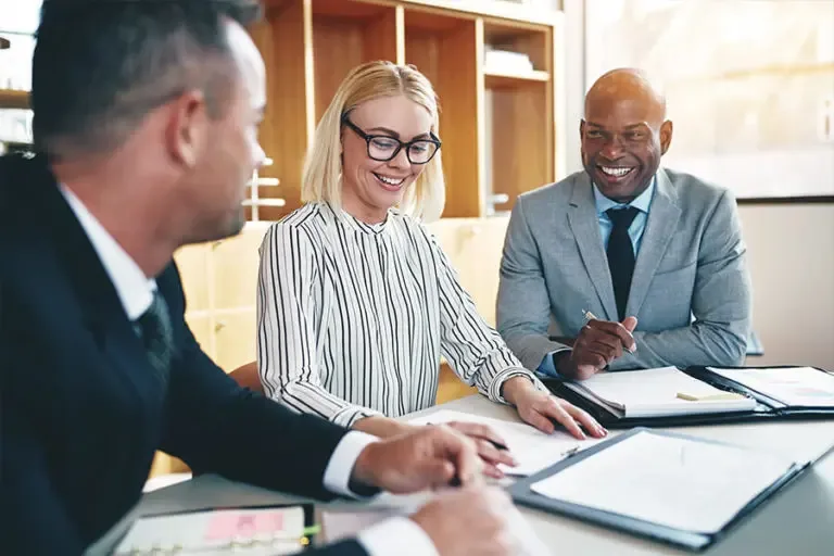 Risk Management Insurance Advisor Examining Different Risk Options in an Upscale Office Setting 768x512 1 Risk Management Plan and prepare for the future of your business.