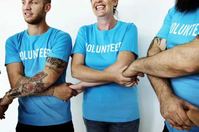 Non Profit Insurance Volunteers Holding Hands and Embracing 768x512 1 Non-Profit Insurance  
