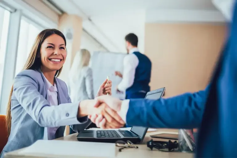 Refer a Friend Handshake Over a Business Meeting in an Office 768x512 1 Refer a Friend  